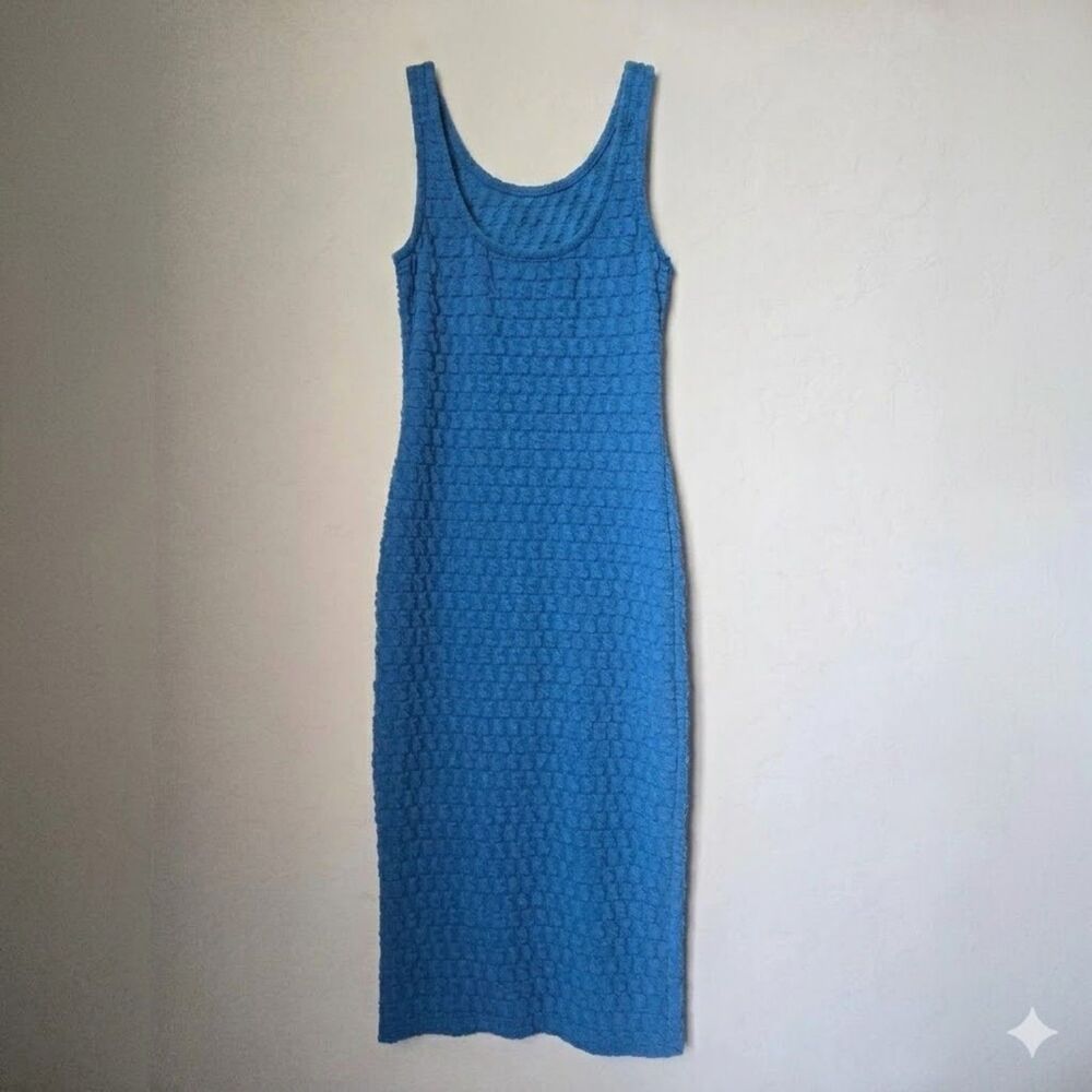 Roselyn Sanchez Blue sleeveless stretch fabric, body-hugging fit. Size M.